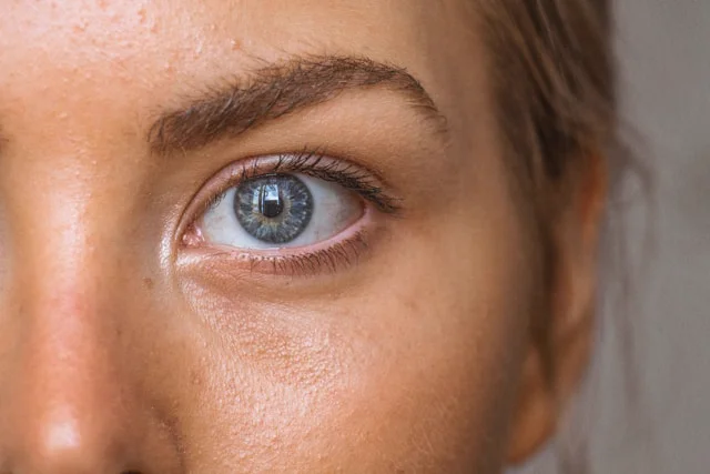 Close-up of a patient’s eye illustrating LASIK eye surgery candidacy with Dr. Roxanna Gangi